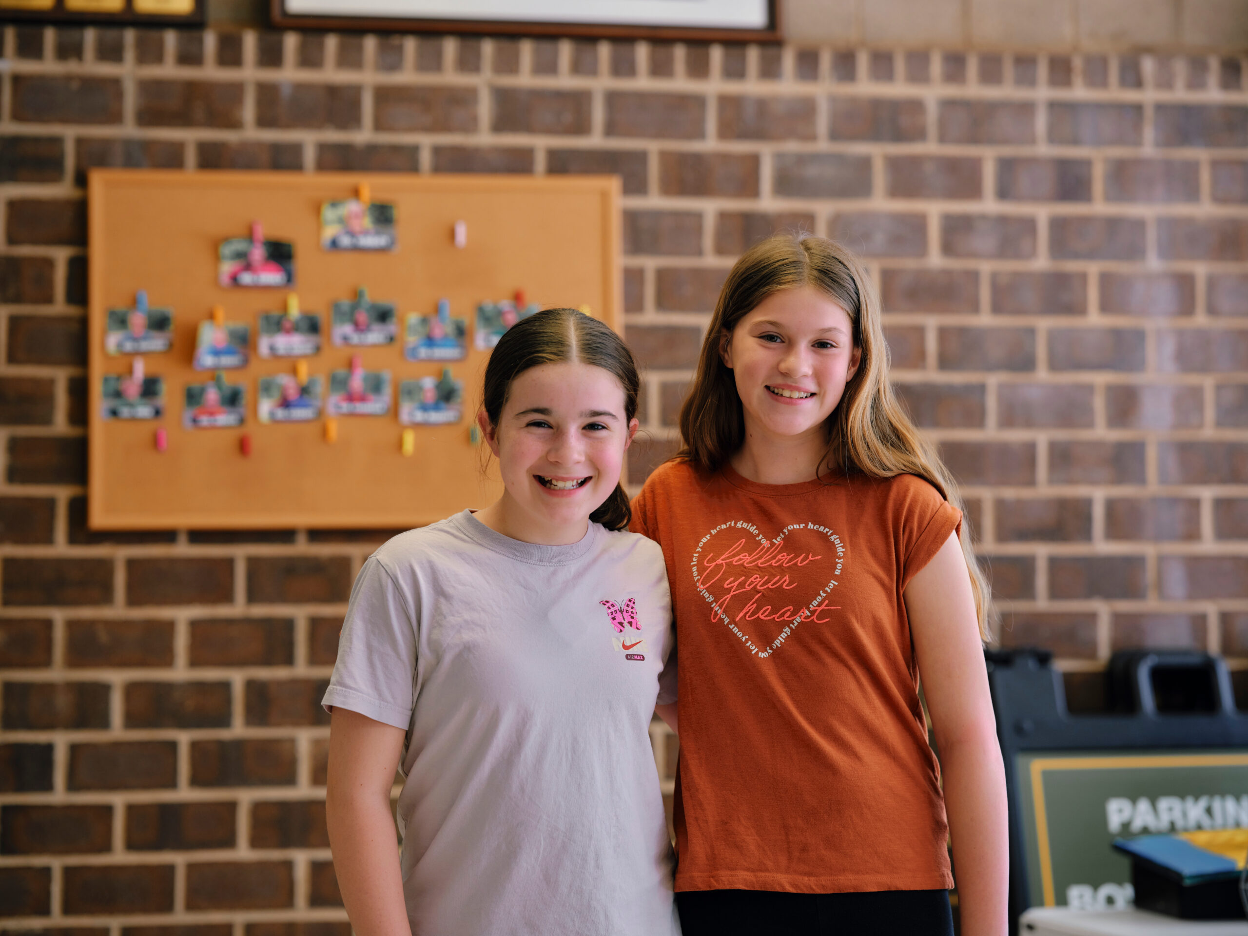 Two Boys & Girls Club members smiling together