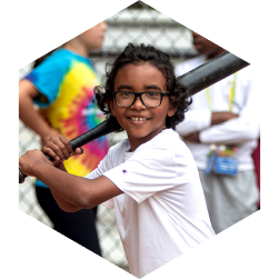 Child holding a baseball bat
